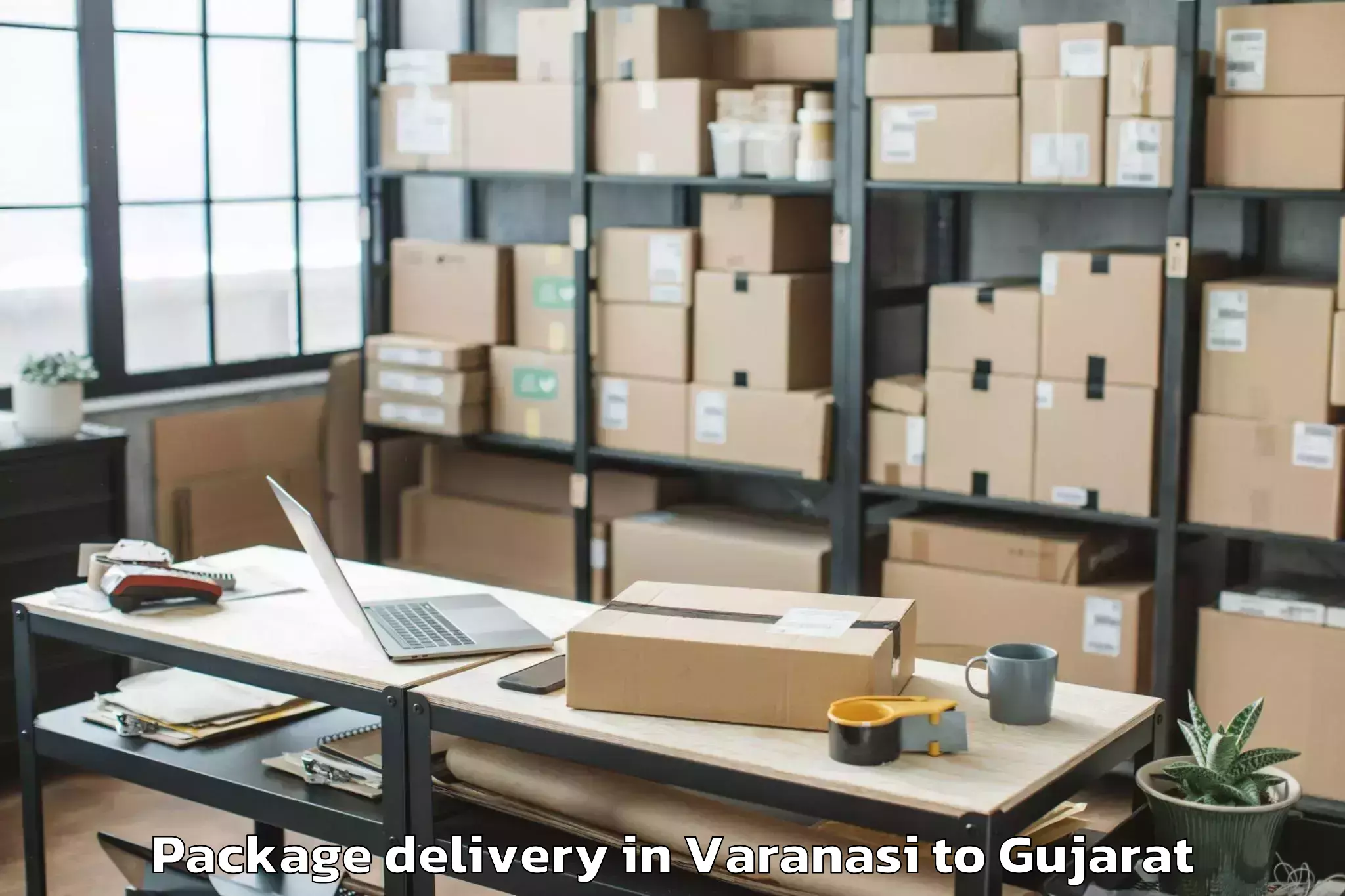 Trusted Varanasi to Navsari Agricultural Universit Package Delivery